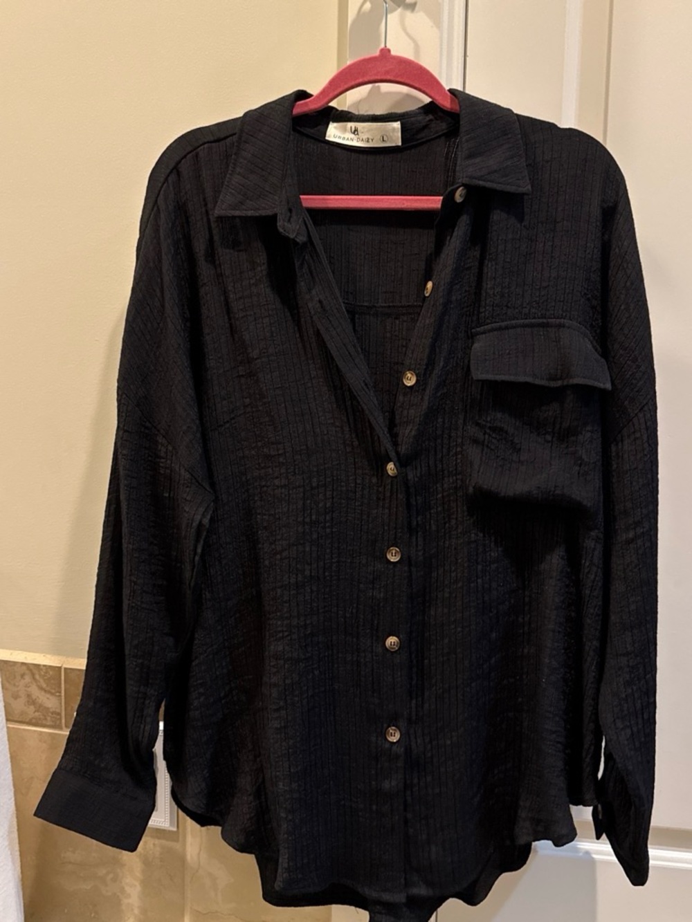 Woman’s Black Long-Sleeve Button-Up Shirt